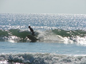 Dr. John pulling a hard right bottom turn, the first real day of Tropical Storm Maria, at the Cape.