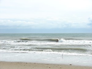 Some of the other barrels didn't have the ceremony of the chase...this one he had to look for it and pounce it, but others were barrel first, then ride the shoulder after.  Image 3 of 3 shot sequence.  Photo by oldwaverider