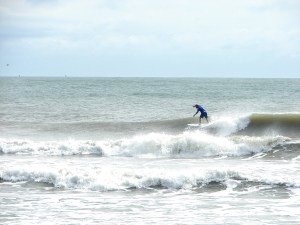 Dave taking advantage of an overcast, drizzly, windy day at the Cape.  Image 1 of 4 in sequence.  Photo by oldwaverider