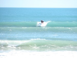 There were rights and lefts to be had.  Probably a chest high wave on these 4 photos, but I kind stayed up high on the face.  Photos by Mike Melito
