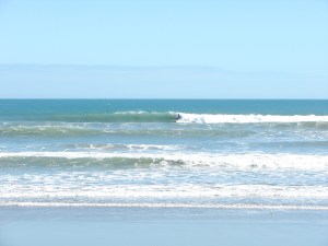 He just got ahead of the section of white water...a nice reward for getting pounded by some white water trying to toss you off your board.  Image 6 of 7 in set.