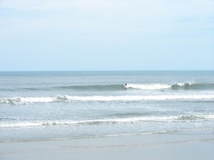 Nice shoulder to head high right.  You had to work these waves high up top to beat the face.  This one closed out on the 4rth photo.  Image 1 of 3 in sequence.