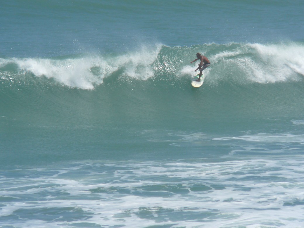 Cocoa Beach Pier, a late drop in right, Hurricane Leslie, photos by Mike Melito