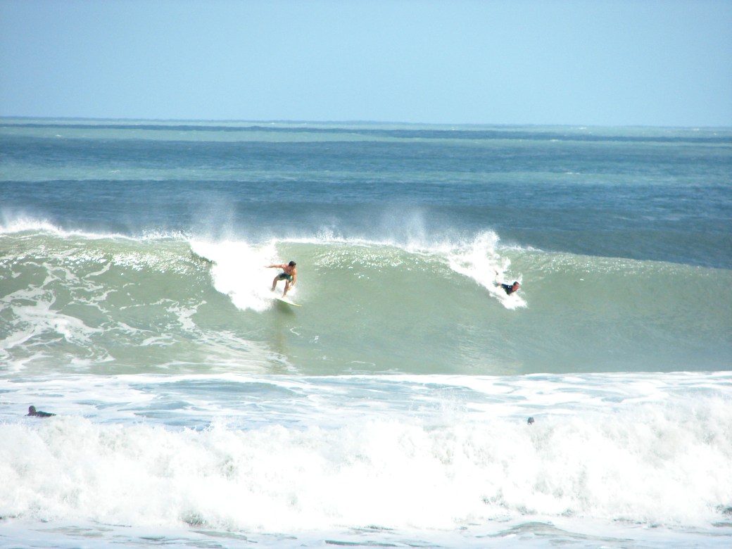 Perfect 12 foot face drop, and yeah, the other guy pulled out, the size did trail off pretty quick after the drop, but a beautiful ride and wave no doubt. Image 1 of 3 in sequence, photos by Oldwaverider