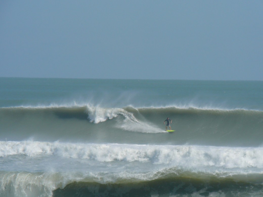 South Cocoa Beach, Hurricane Sandy, solid 12 foot face (3 feet above and below the surfer), photo by Mike Melito