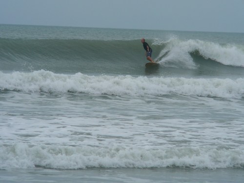 An April 2013 swell at 4rth street north, My buddy Mike Melito.  This may be the size we have by late morning Monday.